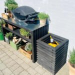 Cache-bouteille de gaz en lattes de bois noires