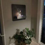 Cheminée murale noire élégante